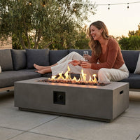 Matteau Low 60 In. L X 12 In. H Outdoor Rectangular Concrete Composite Propane Fire Table in Flint with Vinyl Cover — Lifestyle